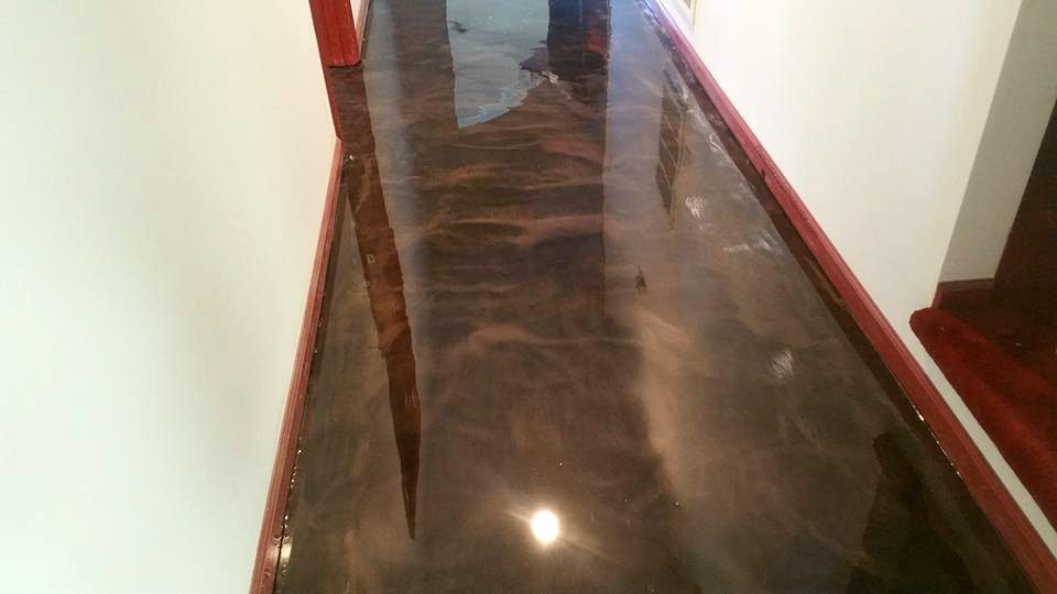 Brown and bronze metallic epoxy floor in a hallway