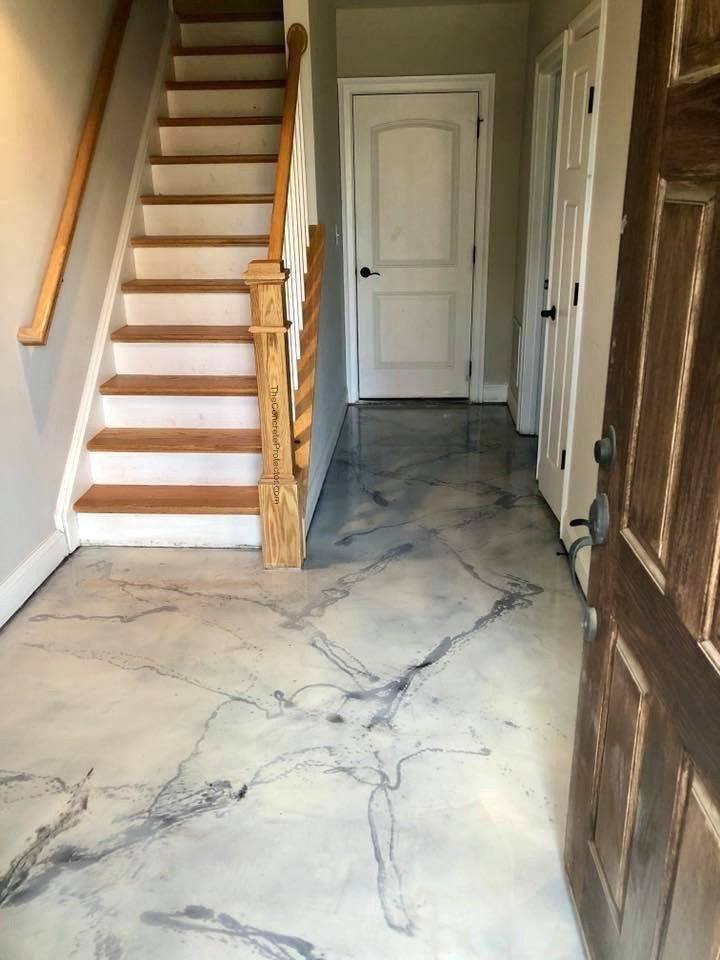 Gray marbled metallic epoxy floor in a home entryway